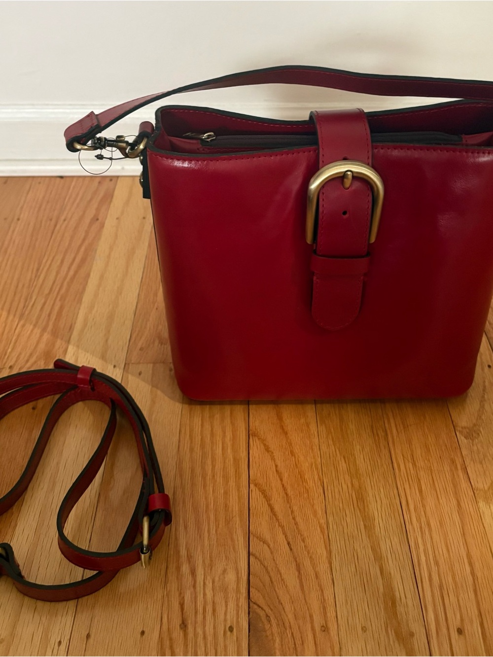 Never worn Patricia Nash Red Leather Crossbody Bag with Gold Buckle